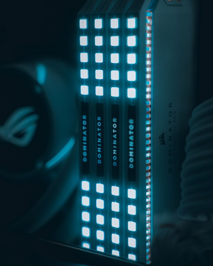 Services Close-up view of glowing computer RAM modules with blue illumination, highlighting technology.