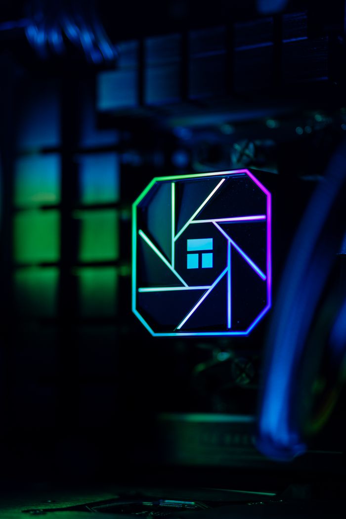 Services Close-up of colorful RGB lighting in a custom-built PC showcasing advanced cooling technology.