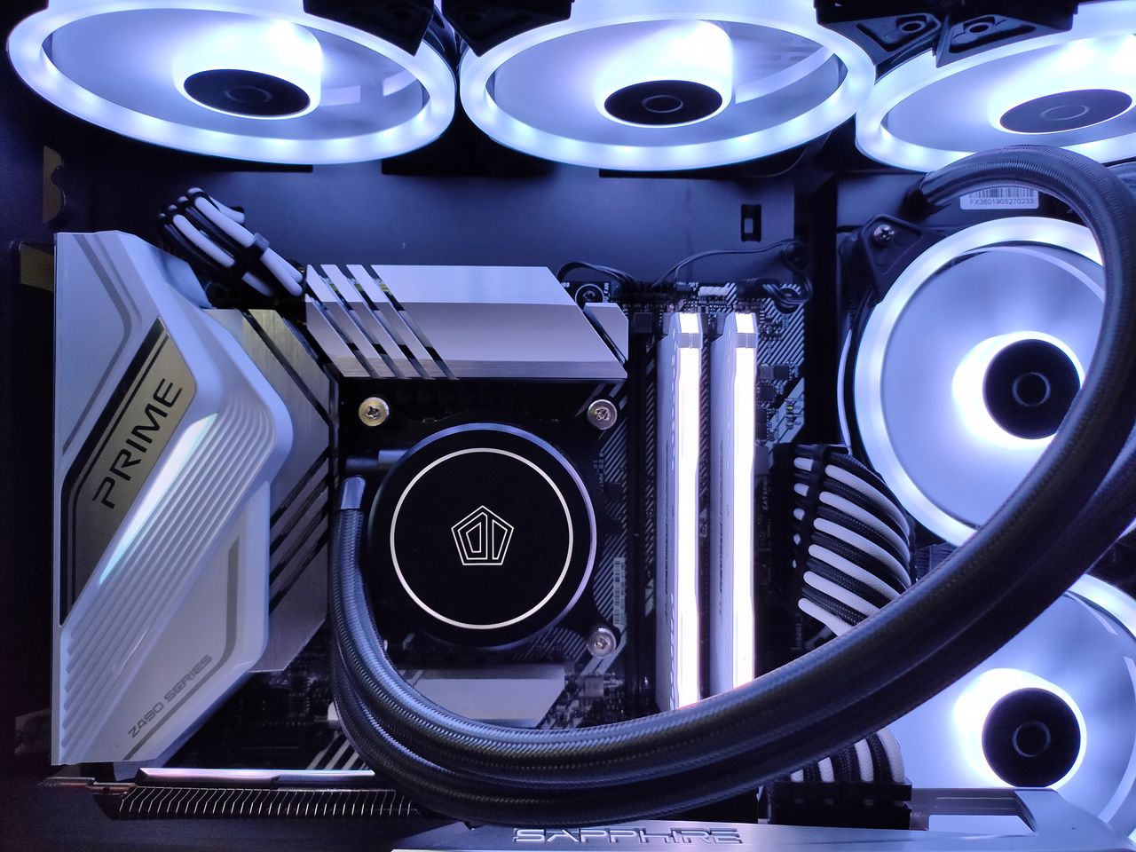 The Art of Drawing Readers In: Your attractive post title goes here Detailed view of a computer setup with LED fans, motherboard, and graphics card in a gaming rig.